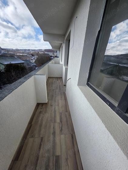 Apartament cu 3 camere decomandat în Bucium