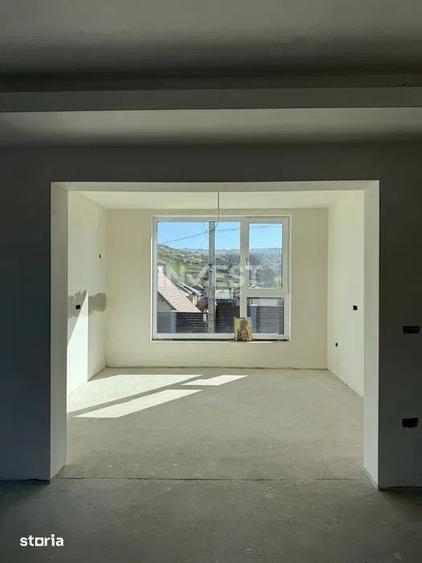 Casă cu 5 camere cu Teren 700 Mp în Bucium