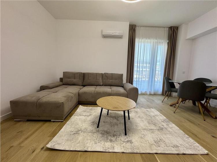 Apartament cu 3 camere semidecomandat, mobilat în Pipera — fotografia 2