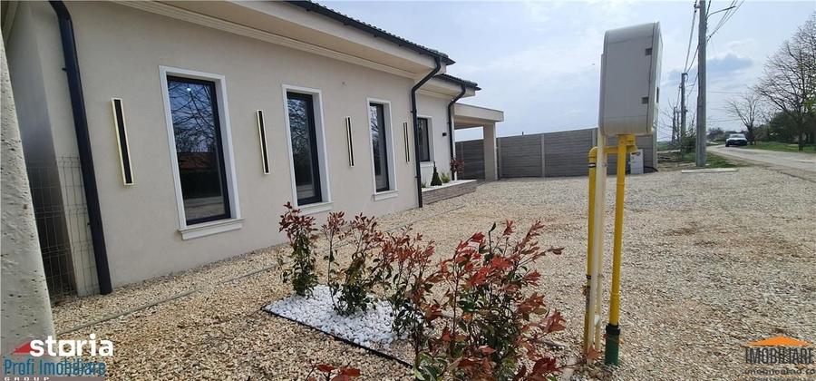 Casă cu 4 camere cu Teren 664 Mp în Zimandu Nou