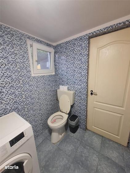Casă cu 4 camere cu Teren 600 Mp în Comana