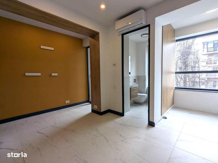 Apartament cu 3 camere semidecomandat în Dorobanți