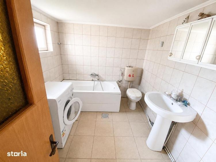Casă cu 4 camere cu Teren 1600 Mp în Central