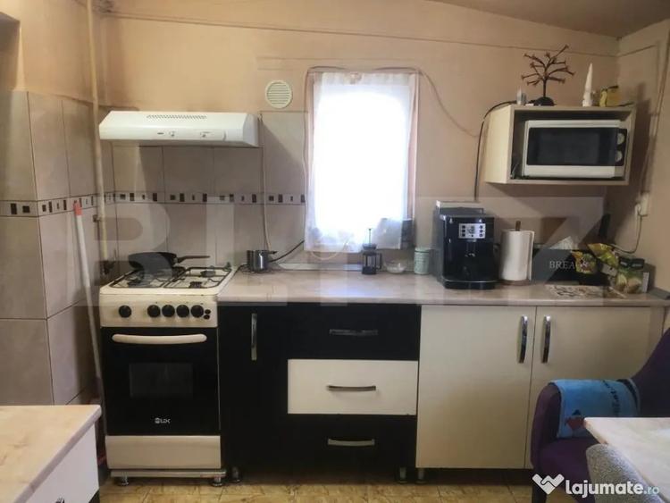 Casă cu 4 camere cu Teren 500 Mp în Carpați 2