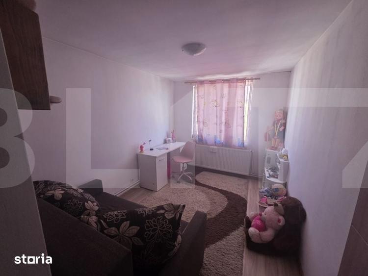 Apartament cu 3 camere semidecomandat în Ozun