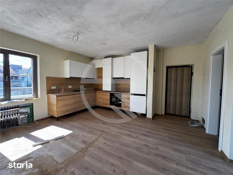 Apartament cu 3 camere semidecomandat în Borhanci