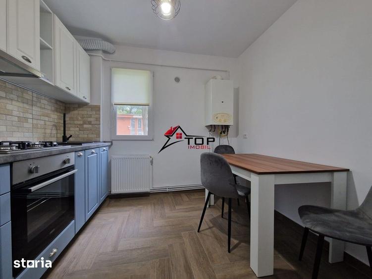 Apartament cu 2 camere semidecomandat, mobilat în Podu Roș