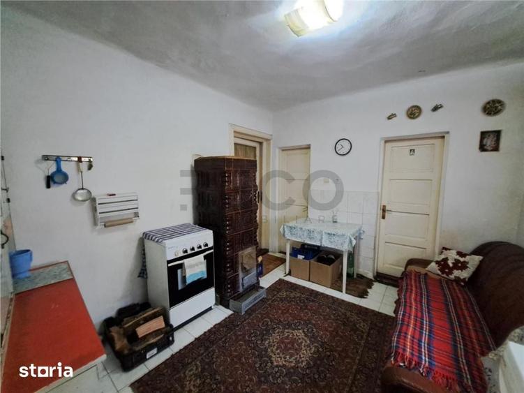 Casă cu 2 camere decomandat cu Teren 257 Mp în Sânmartin