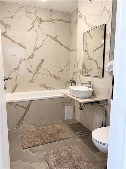 Apartament cu 2 camere decomandat, mobilat în Tractorul