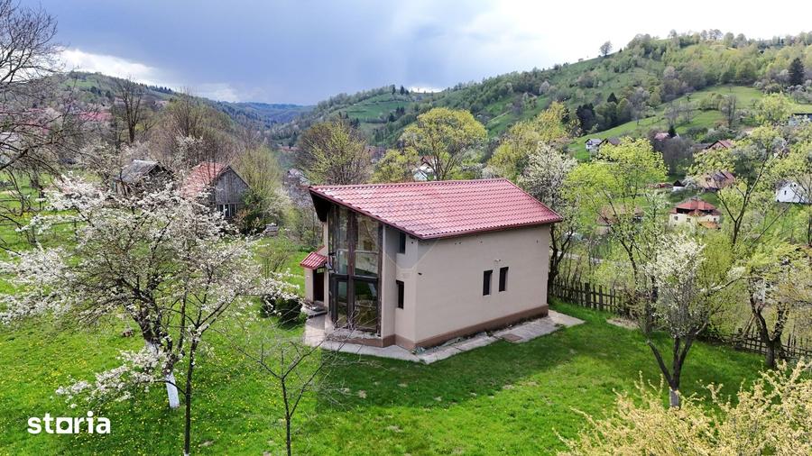 Casă cu 4 camere cu Teren 648 Mp în Moieciu