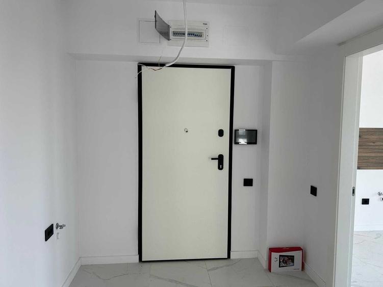 Apartament cu 3 camere decomandat în Cățelu