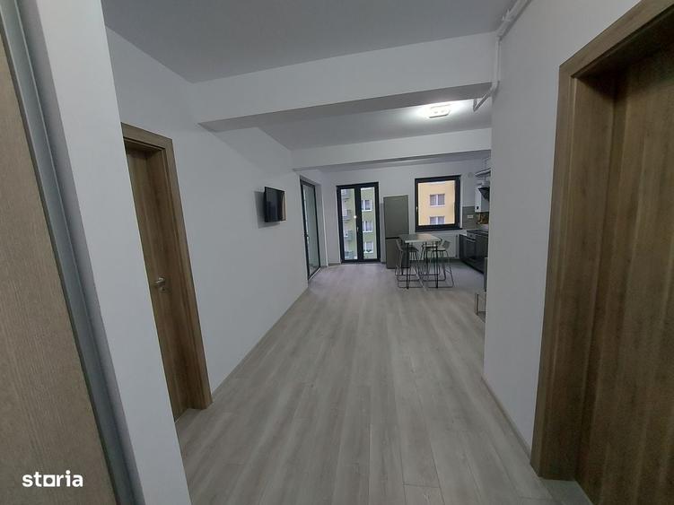 Apartament cu 2 camere decomandat în Tractorul