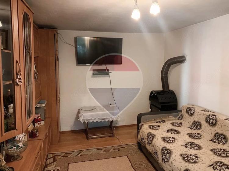 Casă cu Teren 1043 Mp în Dochia