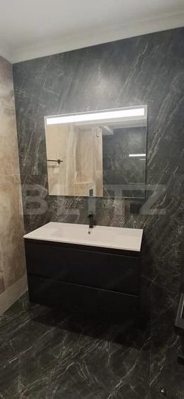 Apartament cu 4 camere decomandat în Filiași