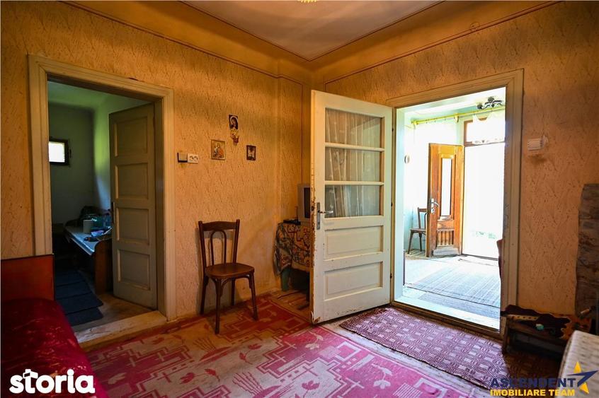 Casă cu 2 camere decomandat cu Teren 4300 Mp în Bran