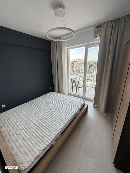 Apartament cu 3 camere în Romană