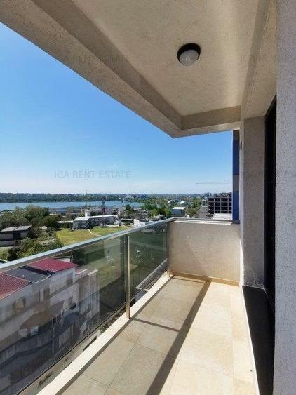 Apartament cu terasa inchisa si vedere catre lac in Faleza Nord - 12