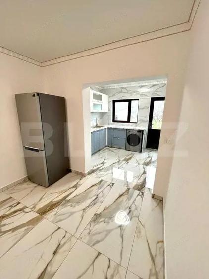 Lini?te, spa?iu ?i elegan?a casa superba langa Titu - 9