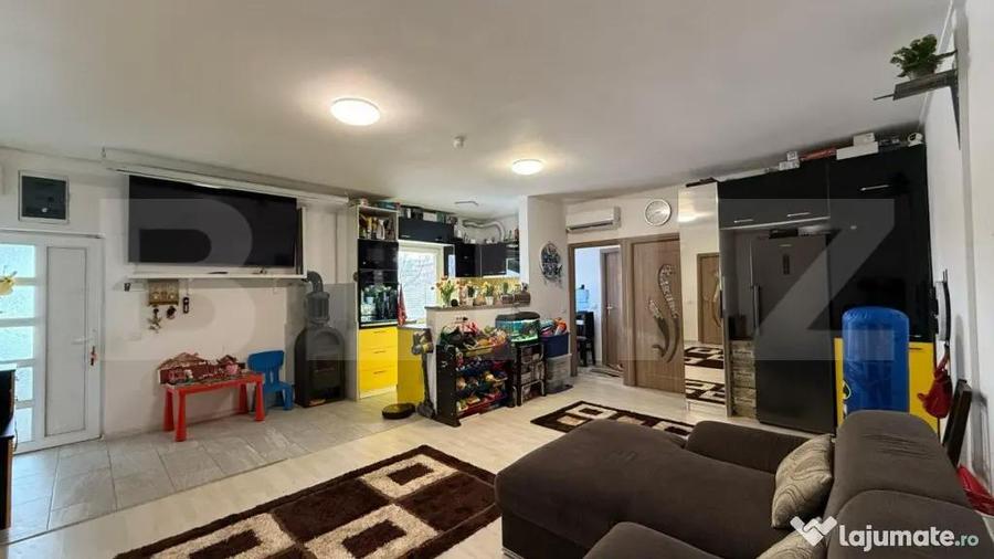 Casa parter 100 mp utili, teren 880 mp, toate utilitatile, C - 1