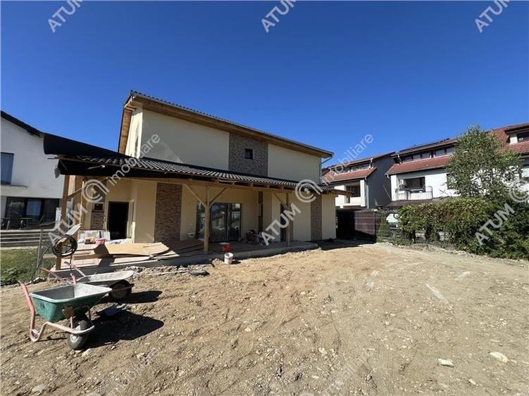 Casa la cheie cu 4 camere 3 bai si teren de 290 mp zona Brana Selimbar - 2