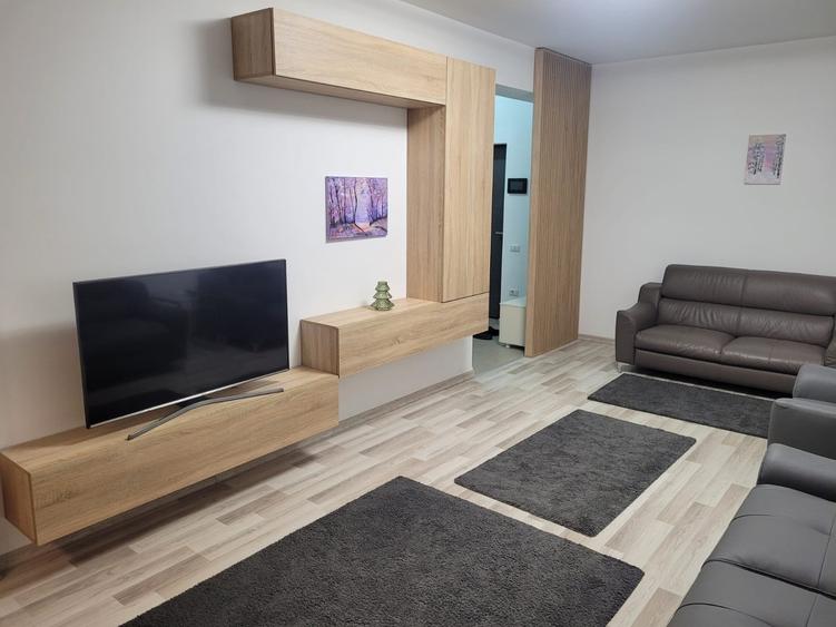 Apartament cu 2 camere, mobilat si utilat. Prima inchiriere. Loc de parcare - 3