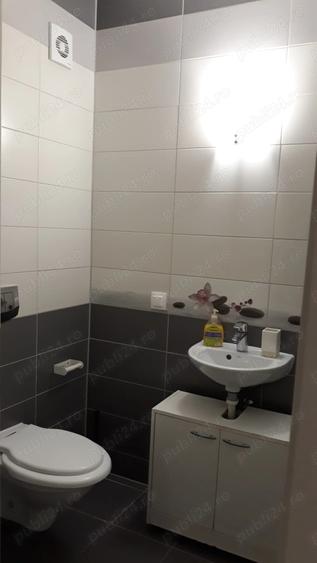 Apartament cu 3 camere decomandat în Tractorul