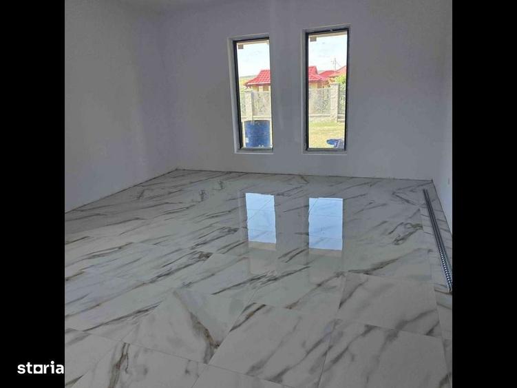 Casă cu 4 camere cu Teren 500 Mp în Central