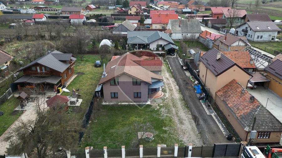 Casă individuală cu 4 camere cu Teren 1000 Mp în Podu Oltului