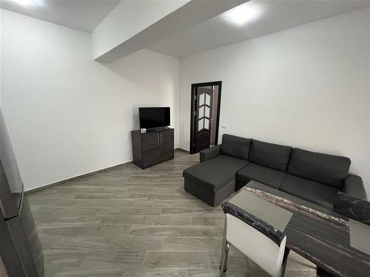 Apartament 2 camere, bloc nou, etaj 2(lift), zona Scoala 10 - 4