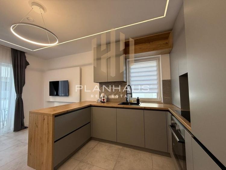 Inchiriere-ultramodern apartament zona rezidentiala ,3 camere,etaj 1,loc de parc - 9