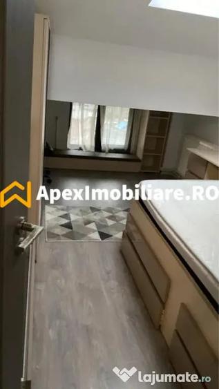 Apartament cu 3 camere semidecomandat în 1 Mai