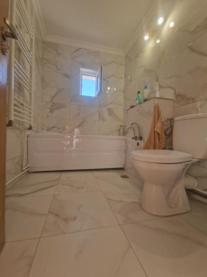 Navodari (Sud)- 2 camere decomandate, centrala gaze, liber -65.000euro - 17