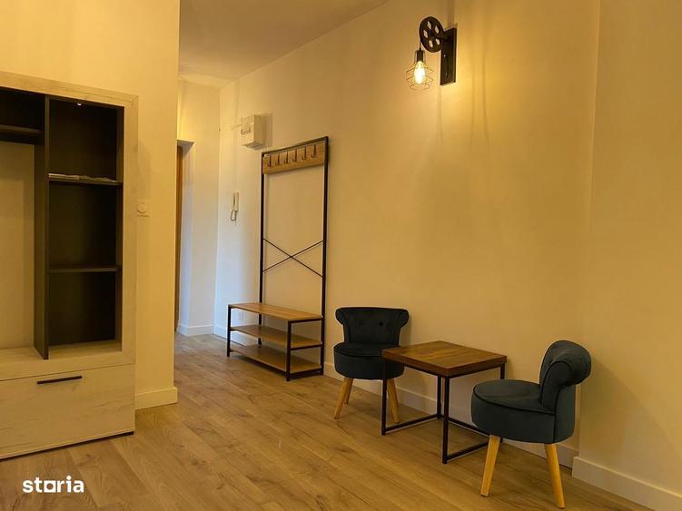 Garsoniera , et 2,str Victoriei ,in zona Pronto - 1