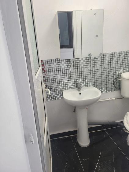 Casă cu 4 camere cu Teren 230 Mp în Central