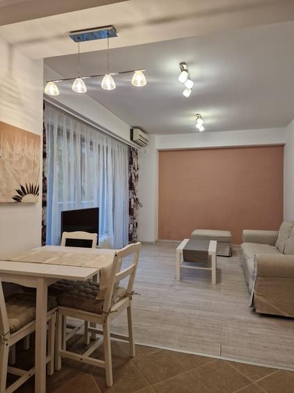 ASE -  Romana - Dorobanti - nou - 2 camere - mobilat modern - centrala termica - 15