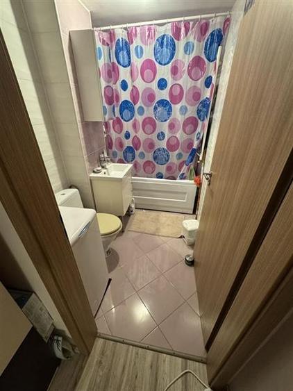 Amenajatat complet, mobilat și utilat la parter cu balcon - 11