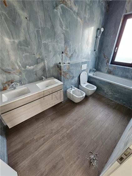 Casa individuala - finalizata - design modern - curte amenejata - 12