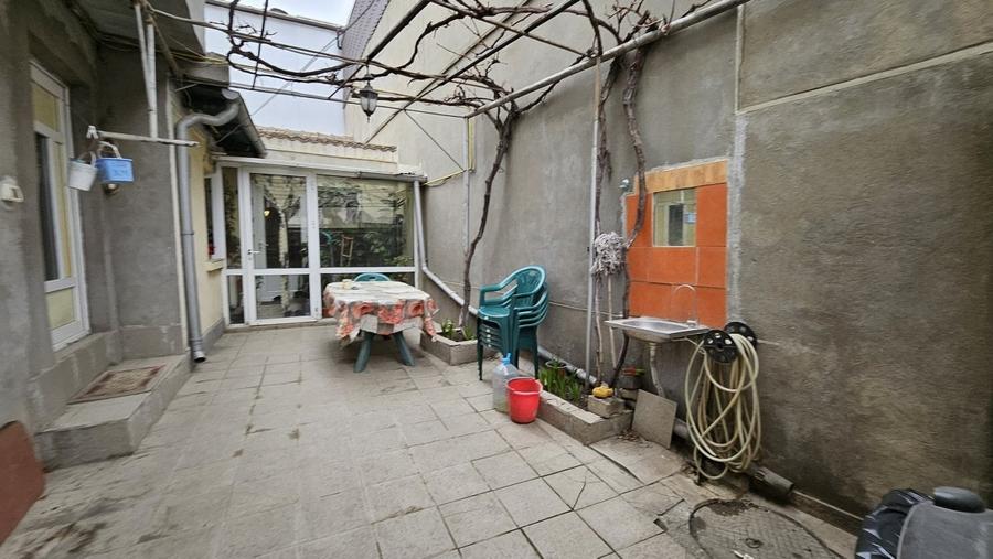 Piata Amzacea - casa 3 camere (suprafata totala teren 114 mp ) - 11