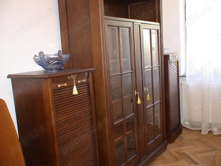 Ofer spre inchiriere ap.2 camere decomandat parter din p+2,mobilat,cu centrala proprie,central,63mp - 2