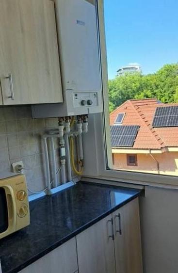 Apartament cu 2 camere decomandat în Podul de Fier
