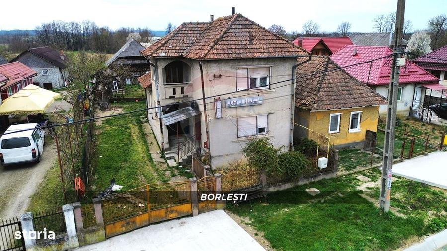 Casa din caramida cu teren generos de 2460 mp si anexe, in Borlesti - 1