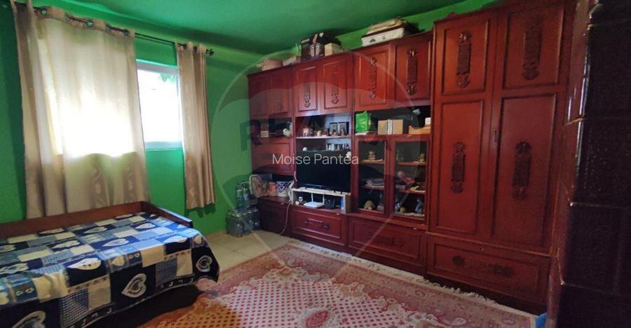Casa cu 4 camere si teren de vanzare in com. Husasau de...