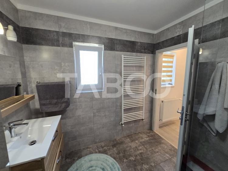 Casa de vanzare 5 camere 160mpu 3 bai 120mp teren liber zona Selimbar - 11
