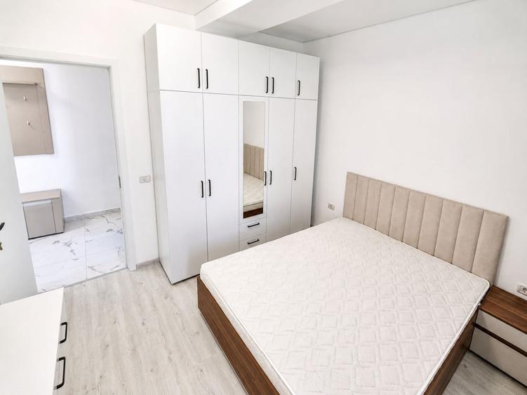 Apartament cu 2 camere, nou, de inchiriat. - 16