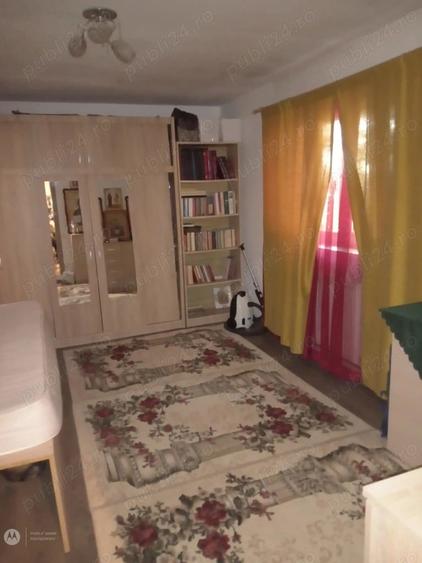 2 camere   in CASA  -central  -curte comuna-intrare separata - 5