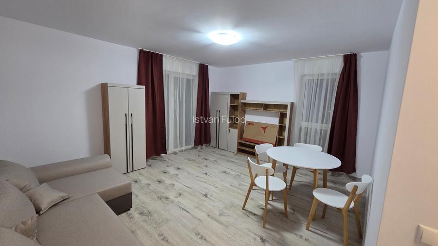 Închiriez apartament 2 camere în bloc nou cu garaj