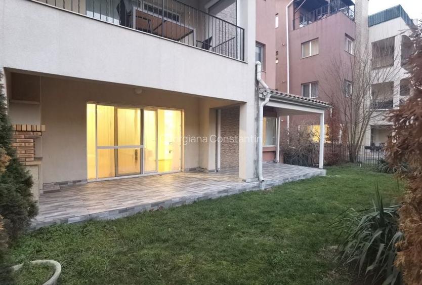 Apartament modern cu gradina,  piscina comuna si spatiu de joaca copii