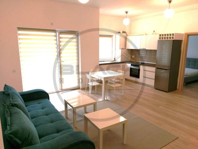 Apartament cu 2 camere semidecomandat, mobilat în Central