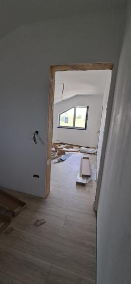 Casă individuală cu 4 camere cu Teren 310 Mp în Holboca