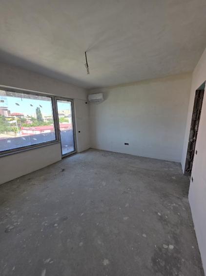 BLOC NOU apartament cu 2 camere 58.7m² de vanzare, ZONA CENTRALA Podu Ros- Bld.S - 9